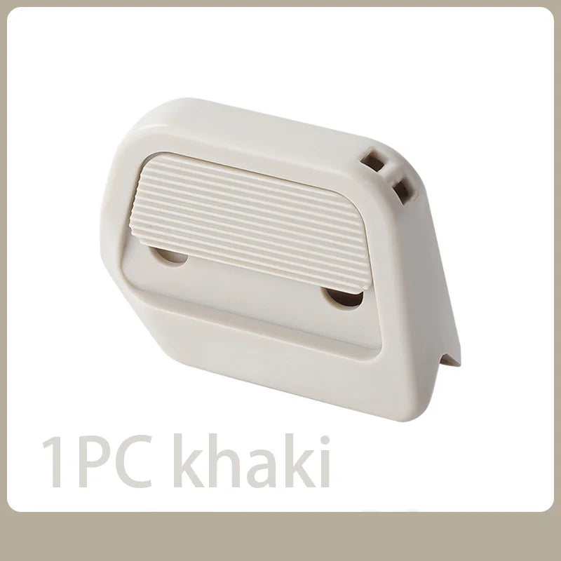 A white retractable ceramic blade cutter with a magnetic lock.