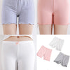 A set of three pink, gray, and white girls bow safety shorts for summer