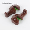 A pair of brown car seat headrest hooks with green accents shown against a white background.