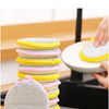 A stack of colorful, soft sponges in yellow and pink are shown on a white plate.