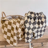 Pair of kids' washed cotton harem pants in a brown and beige checkered pattern displayed on a hanger.