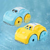 Two floating bath toys, a blue and white car and a yellow car, are shown in water.