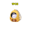 A yellow bear-shaped keychain featuring a white astronaut charm.