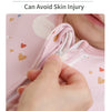 A hand is shown opening the neck flap design of a pink cotton baby sleeping sack with a two-way zipper.