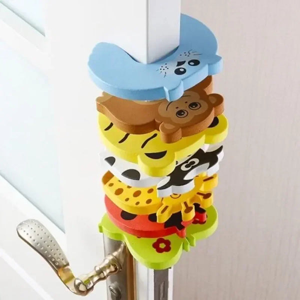 Adorable animal door stoppers for baby safety featuring layered wooden figures in blue, brown, yellow, and green.