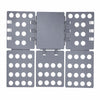 A set of gray clothes folding boards with multiple circular holes for organizing laundry.
