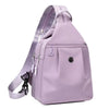 A light purple mini backpack with a zipper and strap is shown from the back.