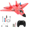 A red foam SU-27 airplane model with attached 2.4G remote control and battery components.