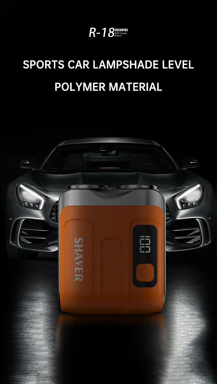 Afeitadora eléctrica naranja con indicador de nivel frente a un auto deportivo negro.