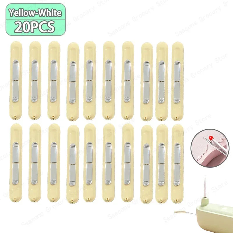 A set of 20 yellow-white needle threaders and seam rippers for sewing projects.