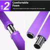 Close-up view of a purple foam wrapped metal tube used as an adjustable Pilates bar.