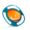 A teal splash-proof gyro bowl with an orange lid and a handle, designed for kids and adults.