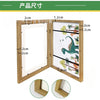 A wooden art display frame showing dimensions and an example of a framed drawing with tropical elements.