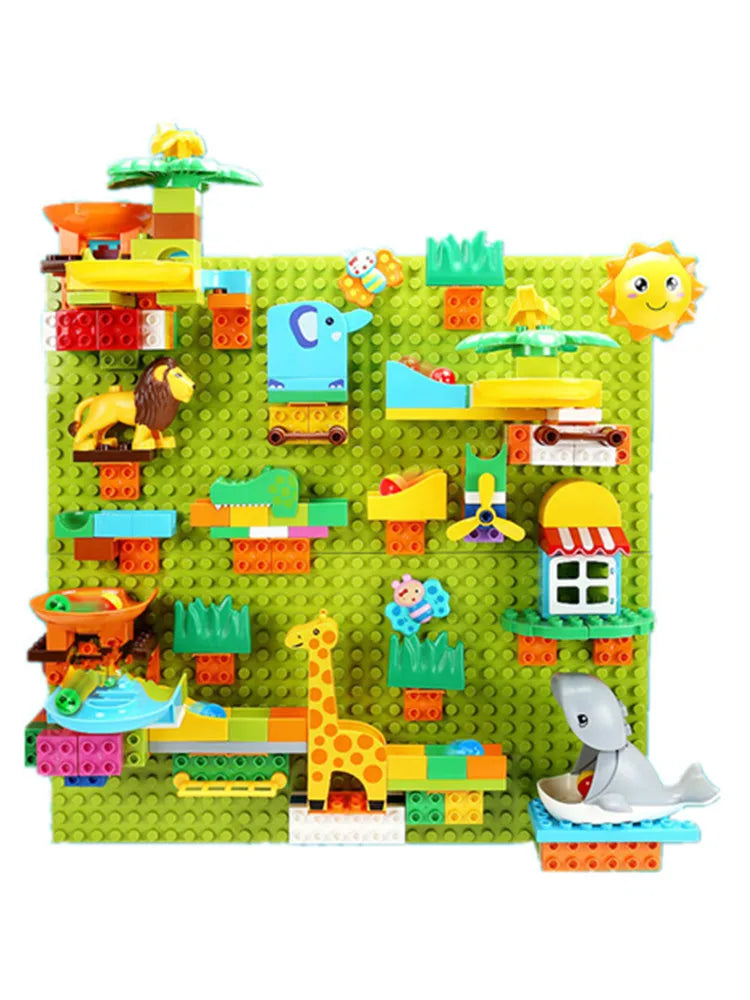 A colorful marble run building blocks set featuring various animal figures and tracks.