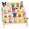 A wooden display rack holds various colorful animal figurine building blocks in different colors and styles.