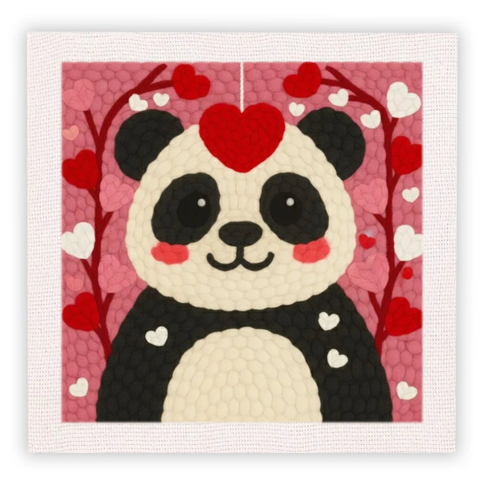 Kit de bordado de aguja mágica rosa con diseño de panda lindo y acentos rojos sobre tela texturizada.