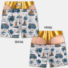 Men's quick-dry swim trunks featuring a patriotic American flag print with palm trees and vintage vehicles.