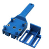 A blue adjustable woodworking dowel drilling guide with a slotted holder.