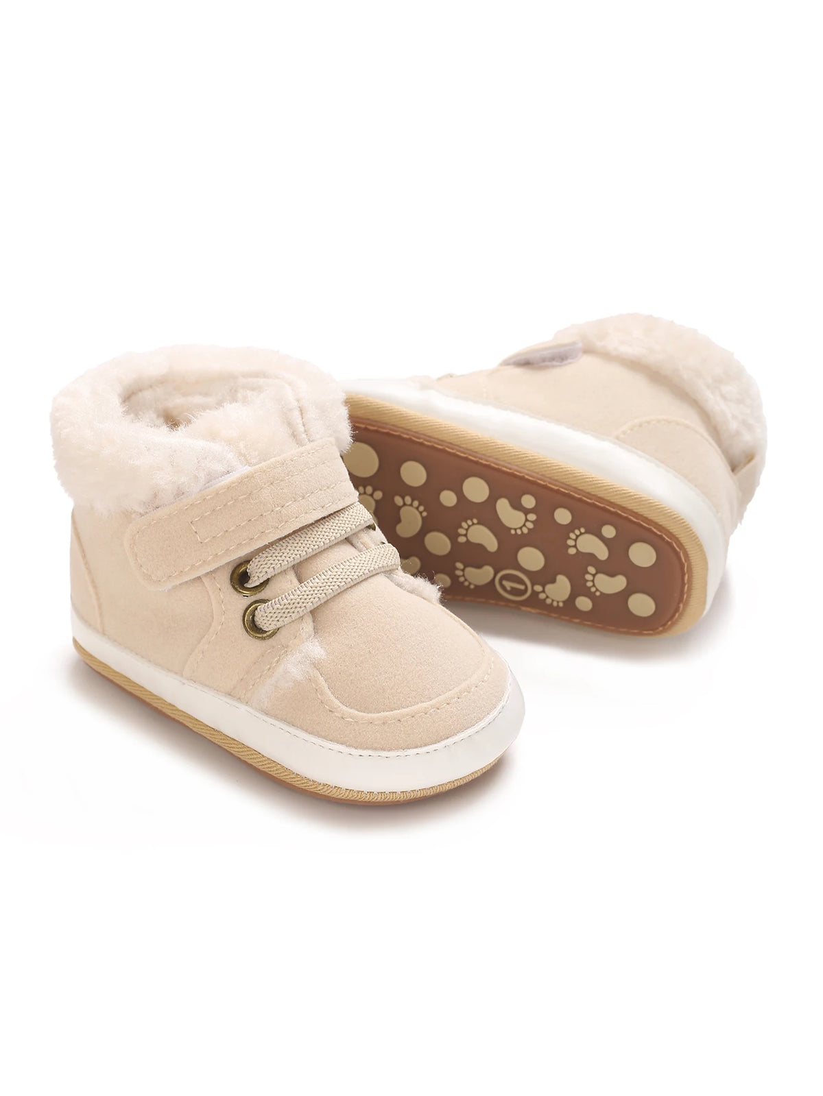 A pair of beige baby winter snow boots with fluffy shearling lining and a brown sole.