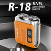 Una mini afeitadora R-18 naranja y plateada sobre una superficie oscura.