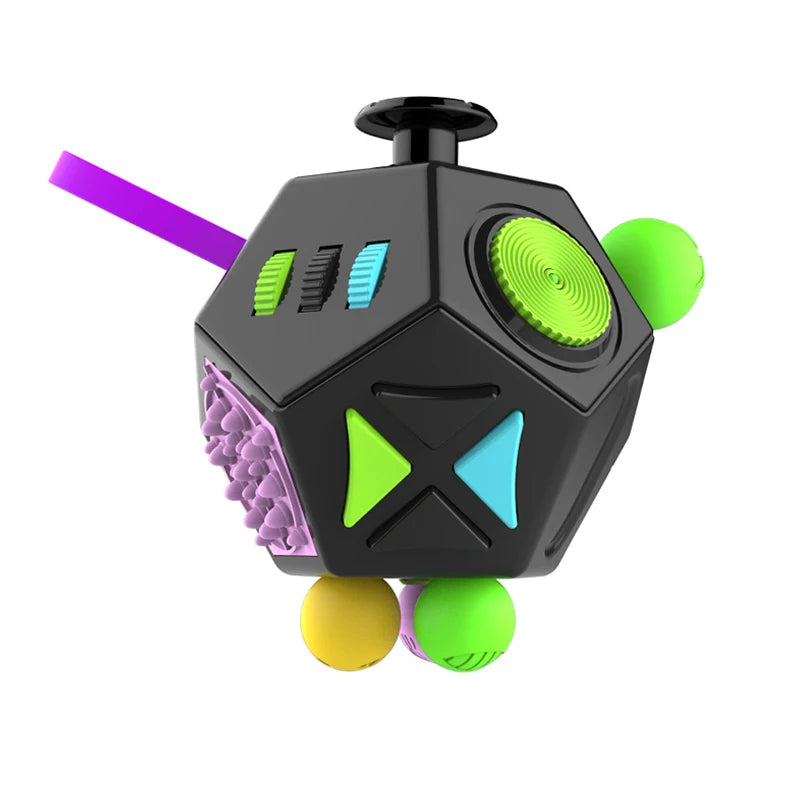 Cubo antiestrés negro con acentos verdes, morados y azules y bolas coloridas.