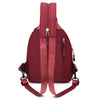 A maroon mini backpack with a zipper closure and adjustable strap is shown against a white background.