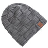 A gray knit beanie with a textured, diamond-patterned design.