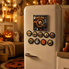 A white refrigerator door decorated with Halloween themed magnetic vinyl record player night lights and discs.