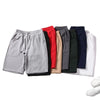 En samling af mænds hurtigtørrende løbeshorts i forskellige farver som grå, rød, sort, beige, olivengrøn og marineblå
