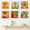 A set of four framed punch needle embroidery kits featuring animal patterns like a giraffe, a monkey, a fox, and an owl.