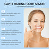 A woman points to her healthy smile while a diagram explains the benefits of Cavity Healing Tooth Armor.
