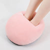 A pink cozy USB heated foot warmer with a soft fleece cover is shown on a person's foot.