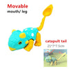 Yellow and blue caterpillar toy with a movable mouth/leg, used as a catapult tail.