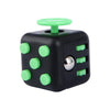 Cubo fidget negro con puntos verdes claros y tapa verde, diseñado para aliviar el estrés.