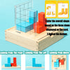 A wooden puzzle game showing three views of a cube shape: front, left side, and above view.