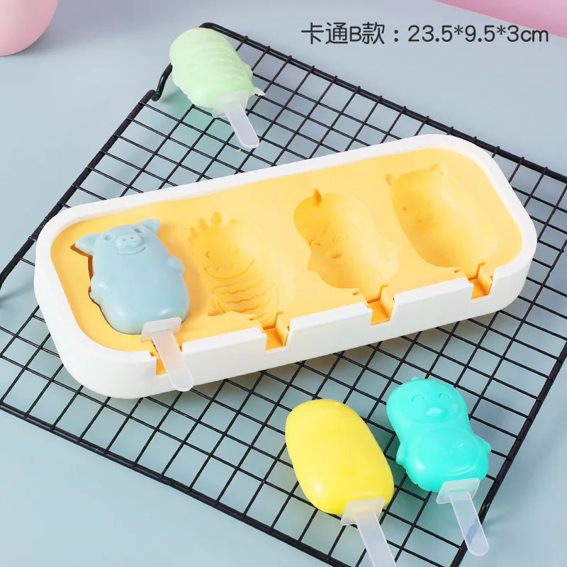 A white silicone mold tray containing yellow and blue silicone popsicle shapes for kids