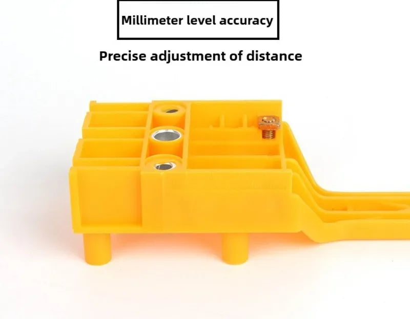 Yellow adjustable woodworking dowel drilling guide with millimeter level accuracy for precise distance adjustment