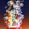 A red fireworks bubble machine is shown with numerous bubbles erupting from the top, set against a dark blue background.