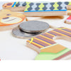 Wooden puzzle pieces shaped like a bear and other animals for Montessori dress-up play