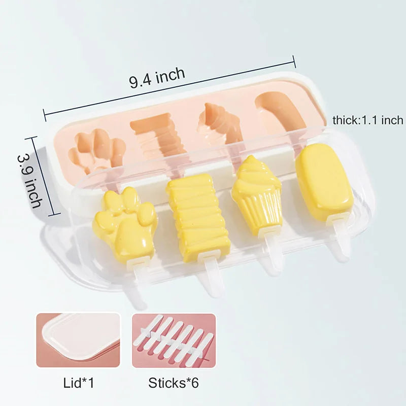 A silicone mold tray with six yellow and peach-colored popsicle sticks and a lid.
