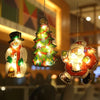 Hanging LED Santa Claus light decorations shaped like a snowman and Santa Claus.