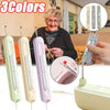 A set of three colored needle threaders and a seam ripper tool displayed next to an elderly woman.