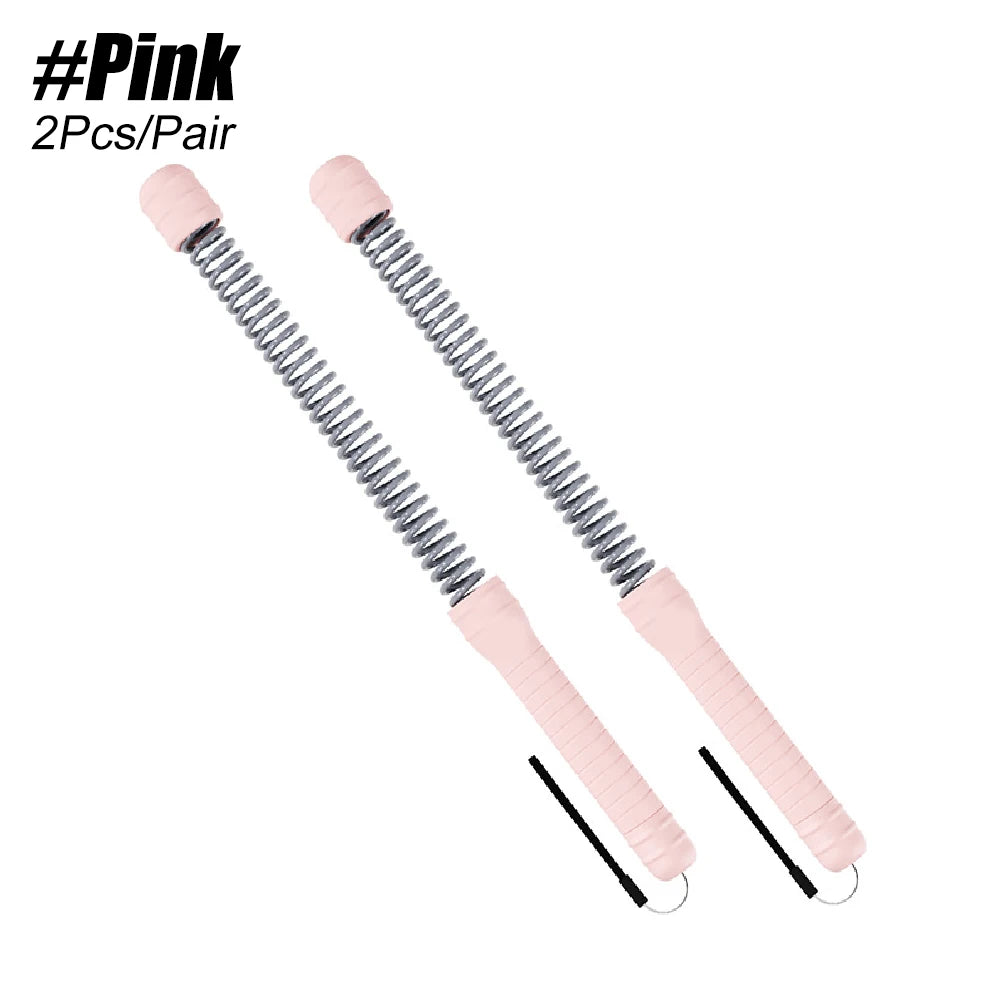 A pair of pink, spring-loaded battle ropes for home workouts.