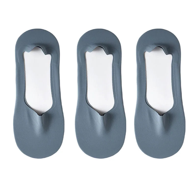 Three pairs of gray silicone grip no-show socks shown from the top view.