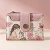 A pink floral print women's wallet featuring a detailed illustration of a woman and a cat.