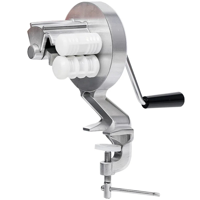 A silver pasta maker machine with a handle and rollers for making homemade cavatelli.