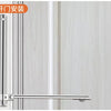 Stainless steel automatic door closer installed on a door frame, showing the mounting plate and handle.