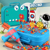 A blue toolbox filled with colorful plastic parts and a pink power screwdriver for a DIY pretend play kit.