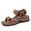 A pair of brown men's genuine leather air cushion sandals with black accents and a light gray sole.