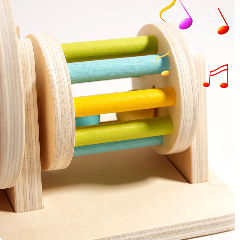 Montessori wooden spinning drum with colorful wooden cylinders for toddlers